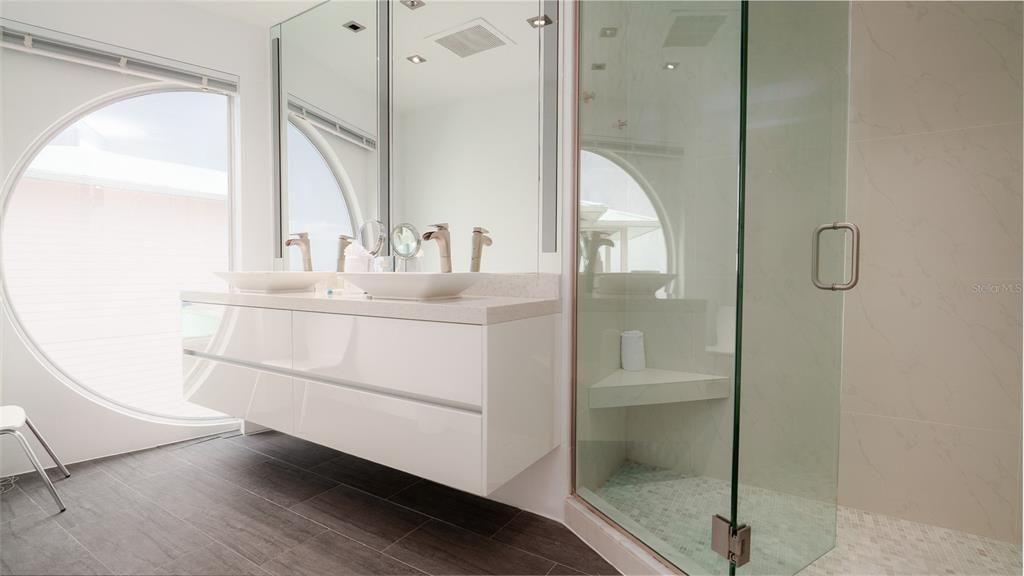 Bathroom, Glass Shower, Interior, Marble Walls, Recessed Lighting, Wood Texture Flooring