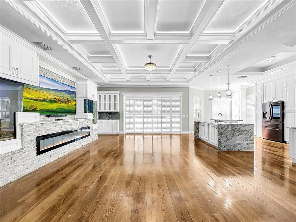 Empty room, Fireplace, Interior, Kitchen, Pendant Lights, Wood Texture Flooring