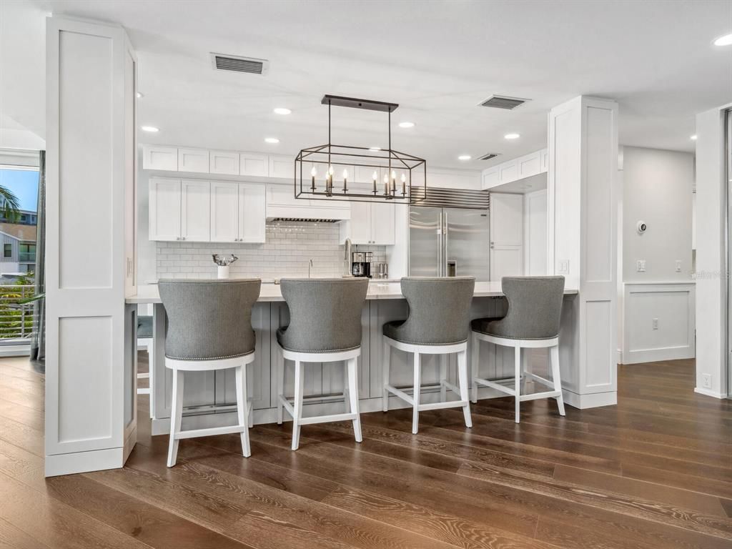 Chandelier, Interior, Kitchen, Pendant Lights, Recessed Lighting, Stainless Steel Appliances, Wood Texture Flooring