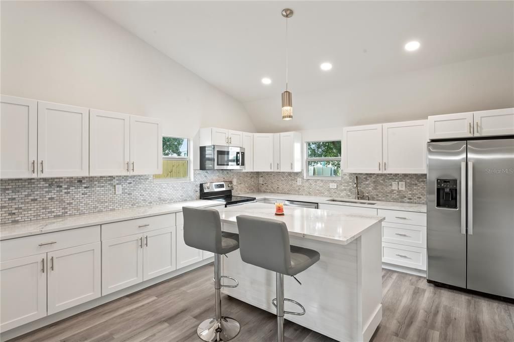 Interior, Kitchen, Pendant Lights, Recessed Lighting, Stainless Steel Appliances, Wood Texture Flooring