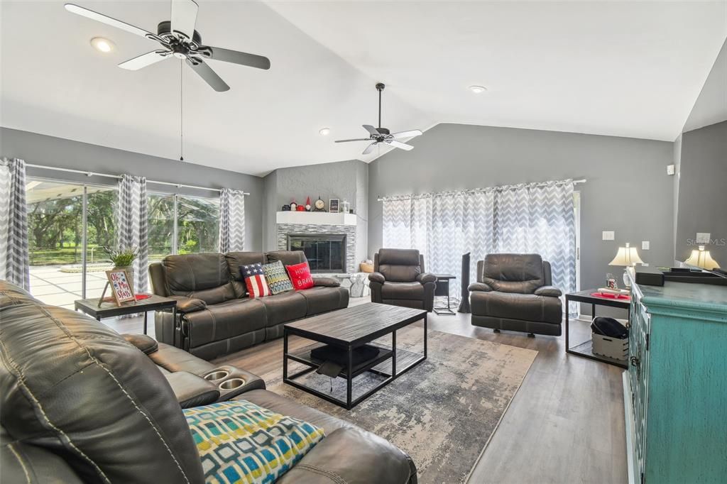 Fireplace, Interior, Living room, Recessed Lighting, Wood Texture Flooring