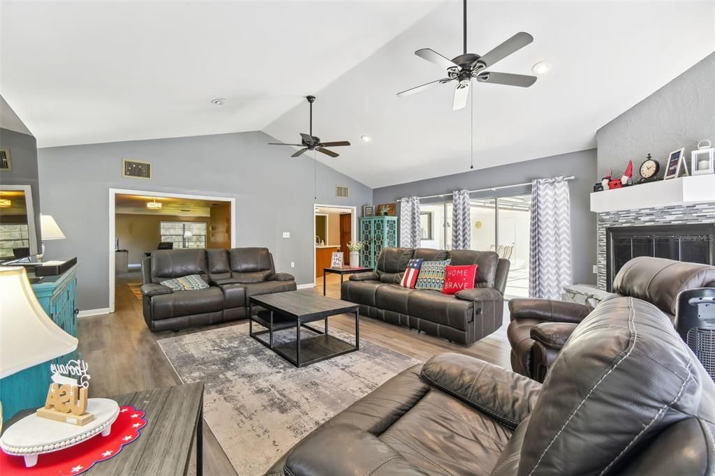Fireplace, Interior, Living room, Recessed Lighting, Wood Texture Flooring