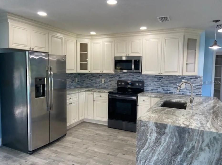 Interior, Kitchen, Pendant Lights, Recessed Lighting, Stainless Steel Appliances, Wood Texture Flooring