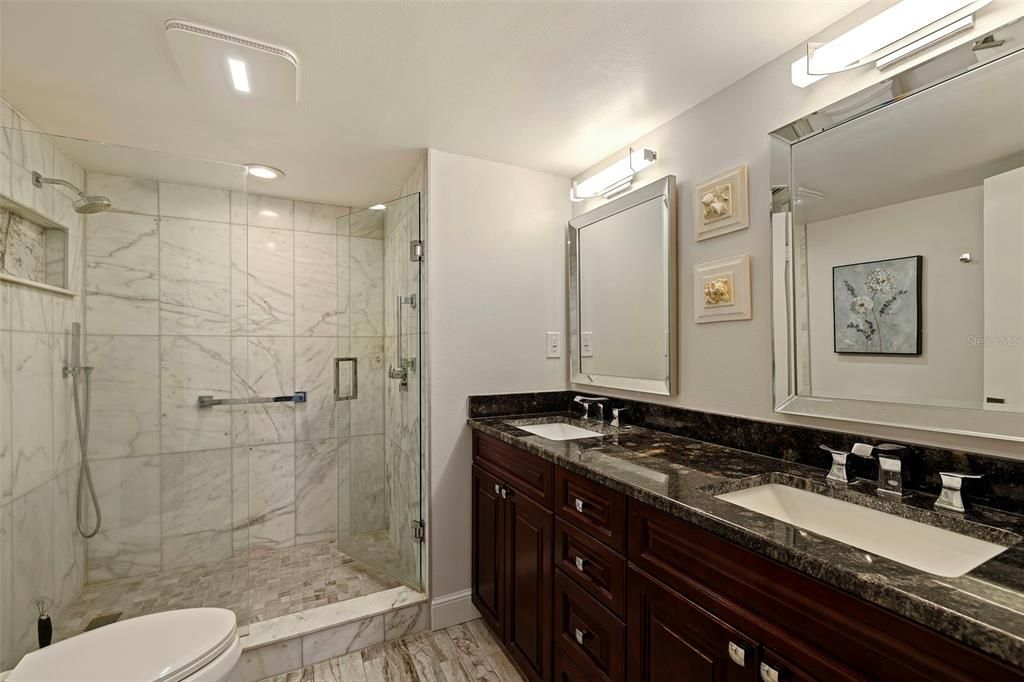 Bathroom, Dual Sink Vanities, Glass Shower, Interior, Marble, Marble Walls, Recessed Lighting