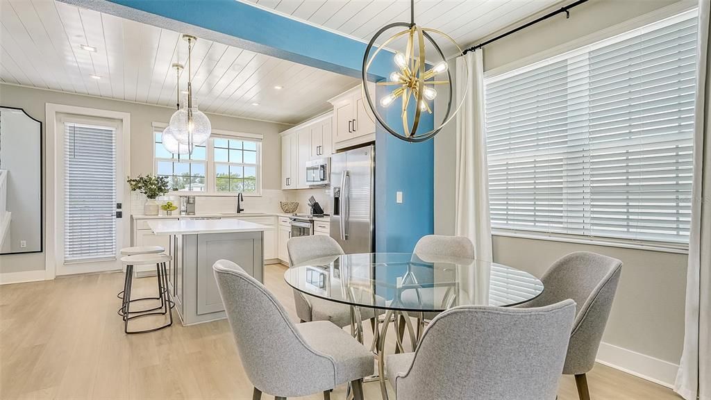 Dining room, Interior, Kitchen, Pendant Lights, Recessed Lighting, Stainless Steel Appliances, Wood Texture Flooring