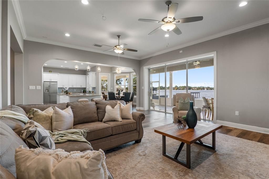 Dining room, Interior, Kitchen, Living room, Recessed Lighting, Stainless Steel Appliances, Water, Wood Texture Flooring