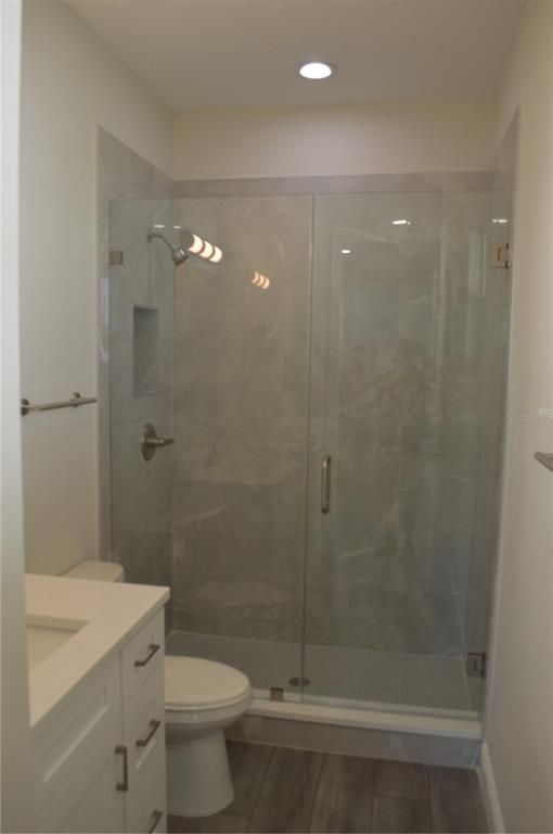 Bathroom, Glass Shower, Interior, Recessed Lighting, Wood Texture Flooring