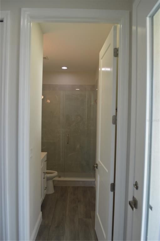 Bathroom, Glass Shower, Interior, Recessed Lighting, Wood Texture Flooring