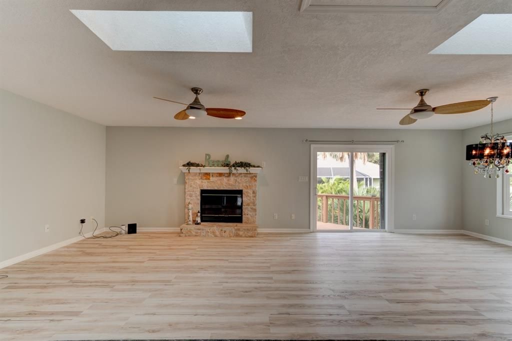 Chandelier, Empty room, Fireplace, Interior, Wood Texture Flooring