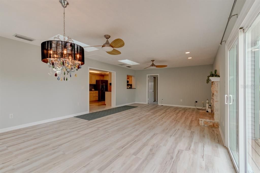 Chandelier, Empty room, Interior, Recessed Lighting, Wood Texture Flooring