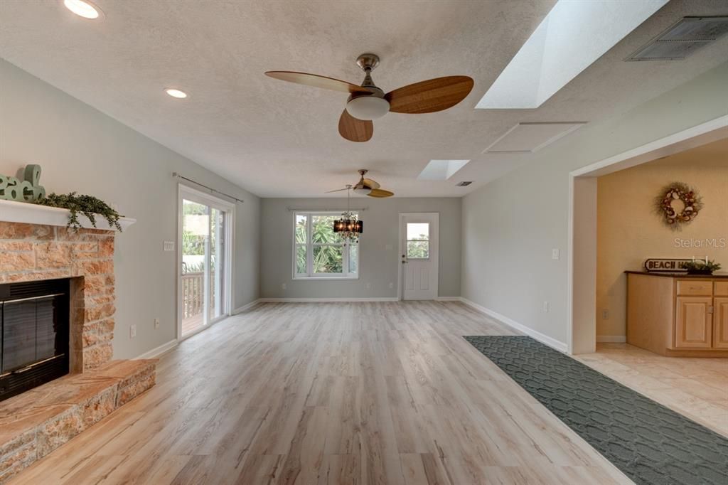 Empty room, Fireplace, Interior, Recessed Lighting, Wood Texture Flooring