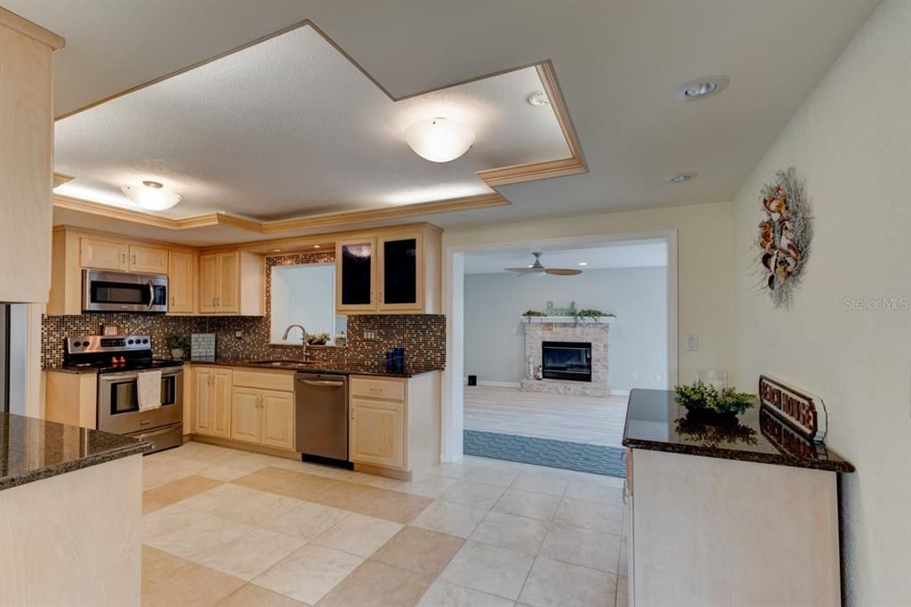 Fireplace, Interior, Kitchen, Recessed Lighting, Stainless Steel Appliances
