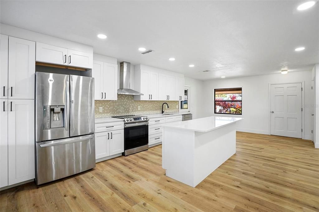 Interior, Kitchen, Recessed Lighting, Stainless Steel Appliances, Wood Texture Flooring