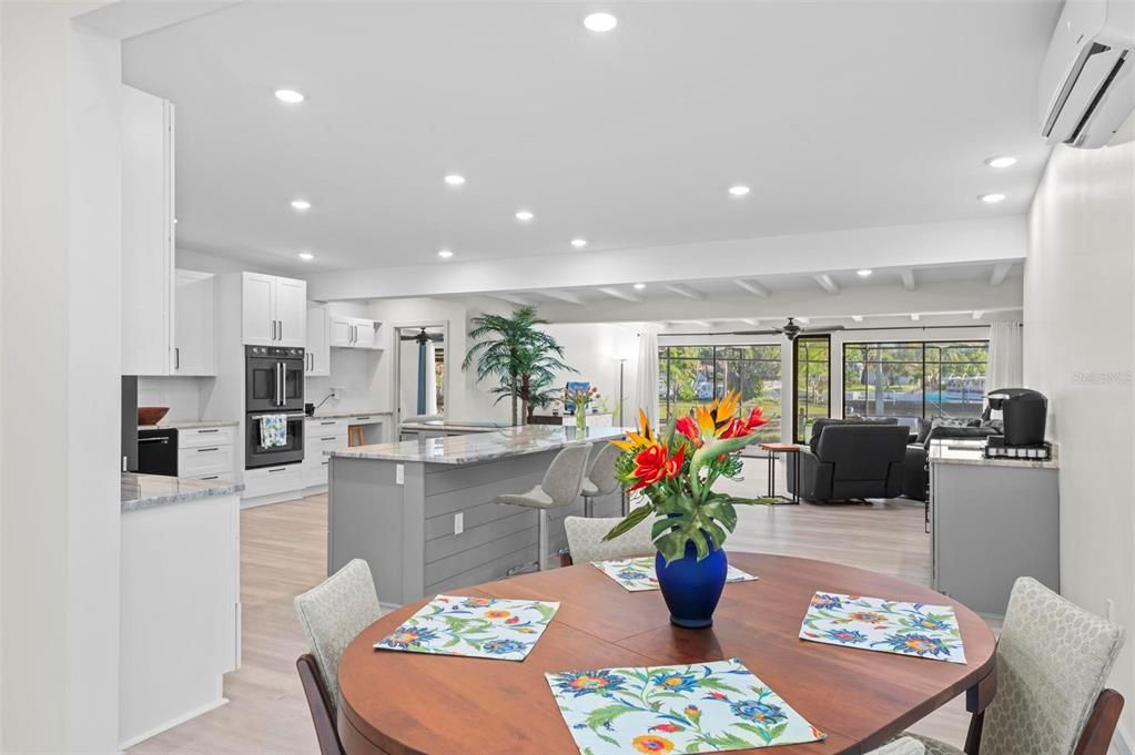 Dining room, Interior, Kitchen, Living room, Recessed Lighting, Stainless Steel Appliances, Wood Texture Flooring