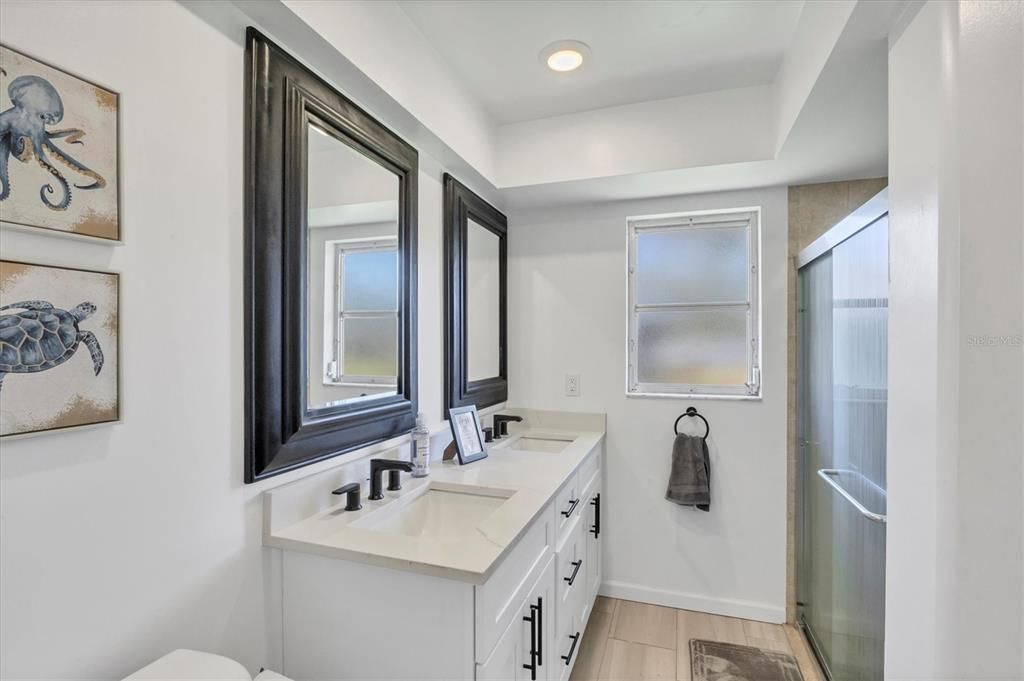 Bathroom, Dual Sink Vanities, Interior, Recessed Lighting, Wood Texture Flooring