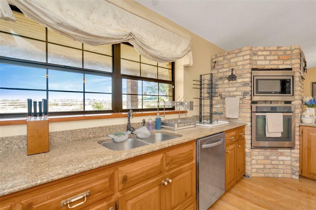Interior, Kitchen, Stainless Steel Appliances, Stone Walls, Wood Texture Flooring