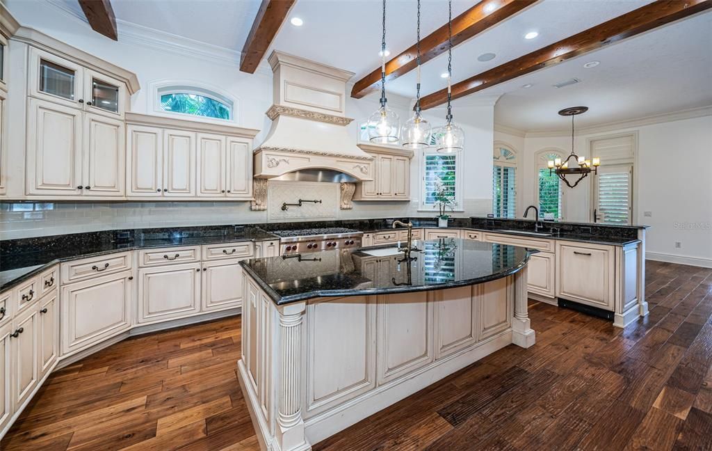 Chandelier, Interior, Kitchen, Pendant Lights, Recessed Lighting, Stainless Steel Appliances, Wooden Beams, Wood Texture Flooring