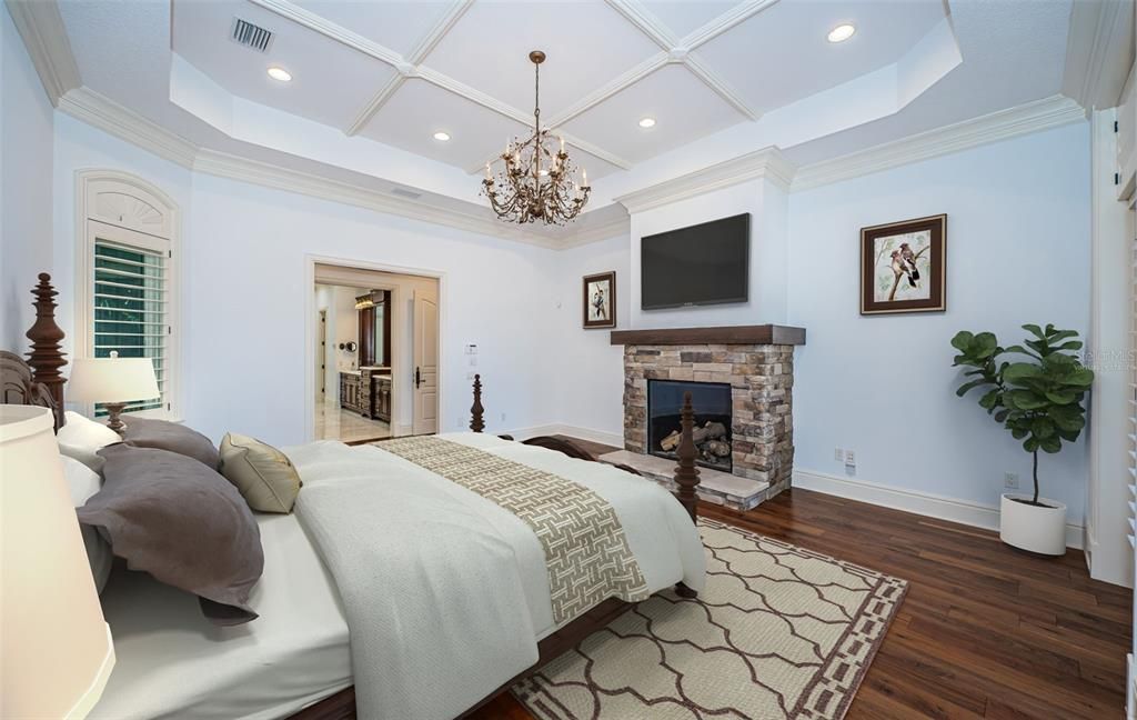 Bedroom, Chandelier, Fireplace, Interior, Recessed Lighting, Wood Texture Flooring