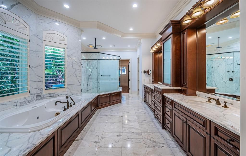 Bathroom, Dual Sink Vanities, Glass Shower, Interior, Marble, Marble Walls, Recessed Lighting