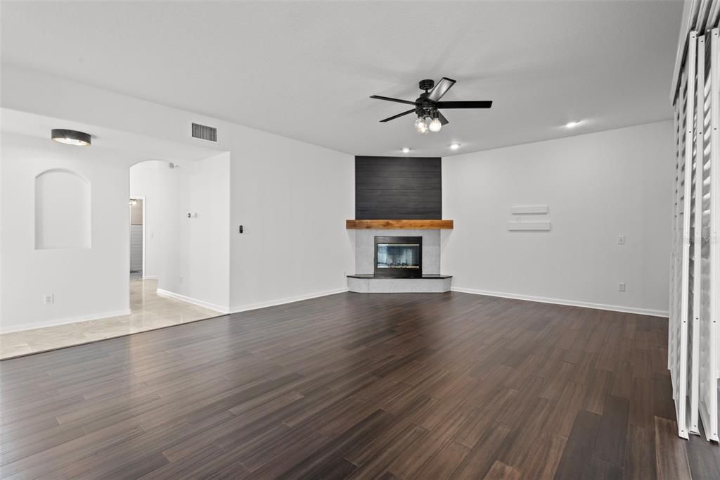 Empty room, Fireplace, Interior, Recessed Lighting, Wood Texture Flooring