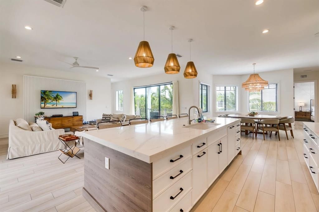 Chandelier, Dining room, Interior, Kitchen, Living room, Pendant Lights, Recessed Lighting, Wood Texture Flooring