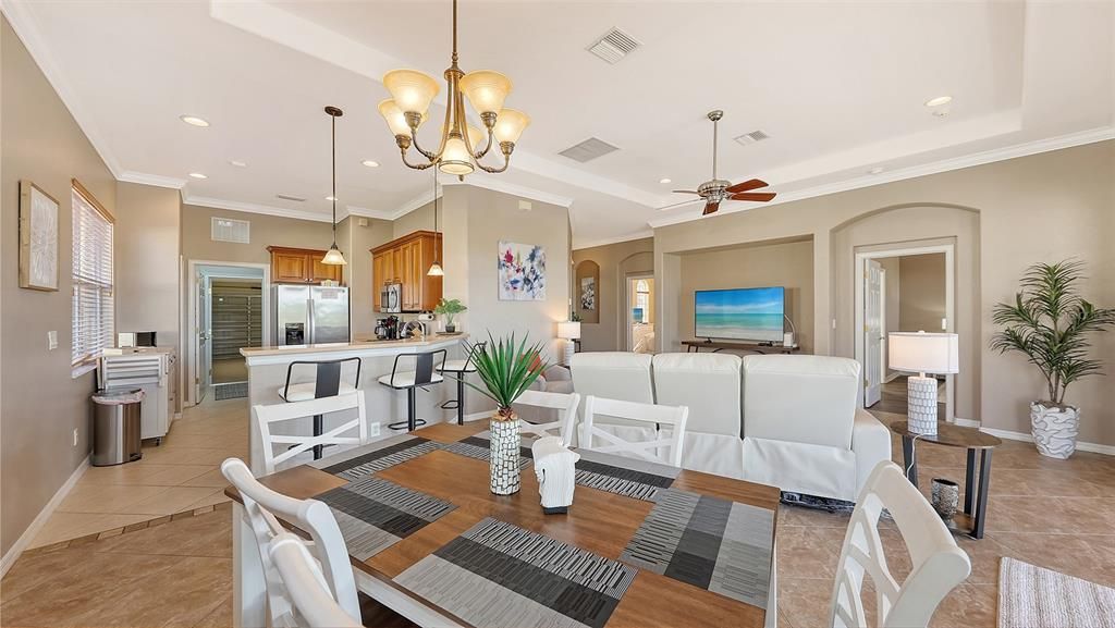 Chandelier, Dining room, Interior, Kitchen, Living room, Pendant Lights, Recessed Lighting, Stainless Steel Appliances