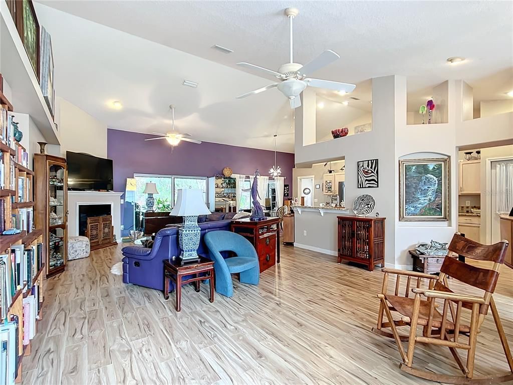Fireplace, Interior, Kitchen, Living room, Recessed Lighting, Wood Texture Flooring