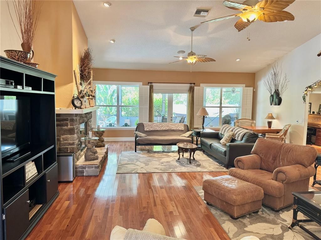 Fireplace, Interior, Living room, Recessed Lighting, Wood Texture Flooring
