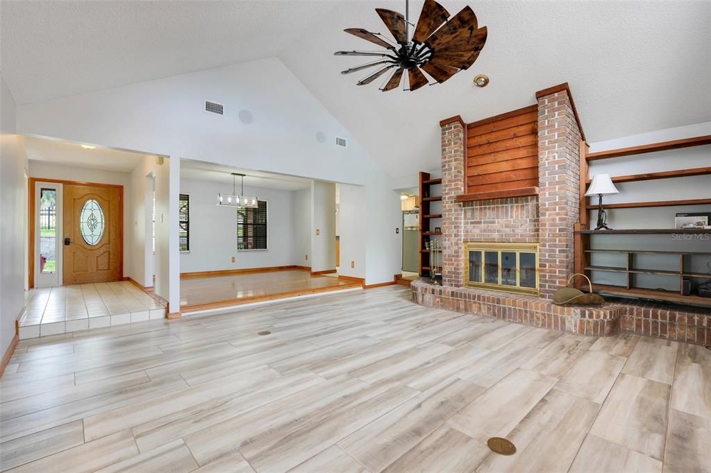 Empty room, Fireplace, Interior, Pendant Lights, Recessed Lighting, Wood Texture Flooring