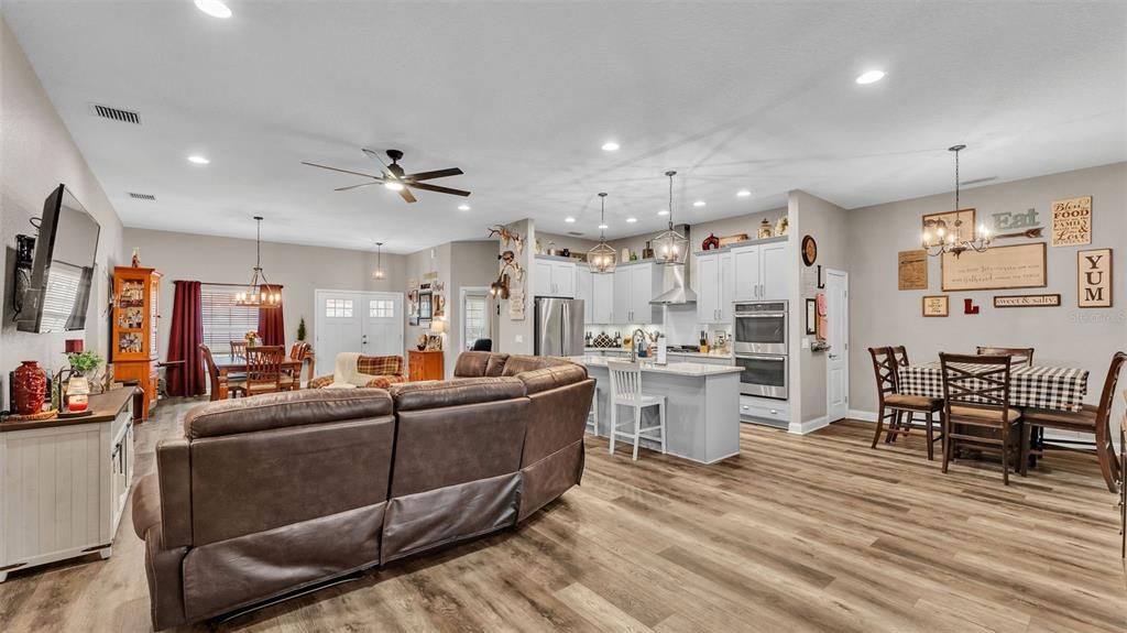 Dining room, Interior, Kitchen, Living room, Pendant Lights, Recessed Lighting, Stainless Steel Appliances, Wood Texture Flooring