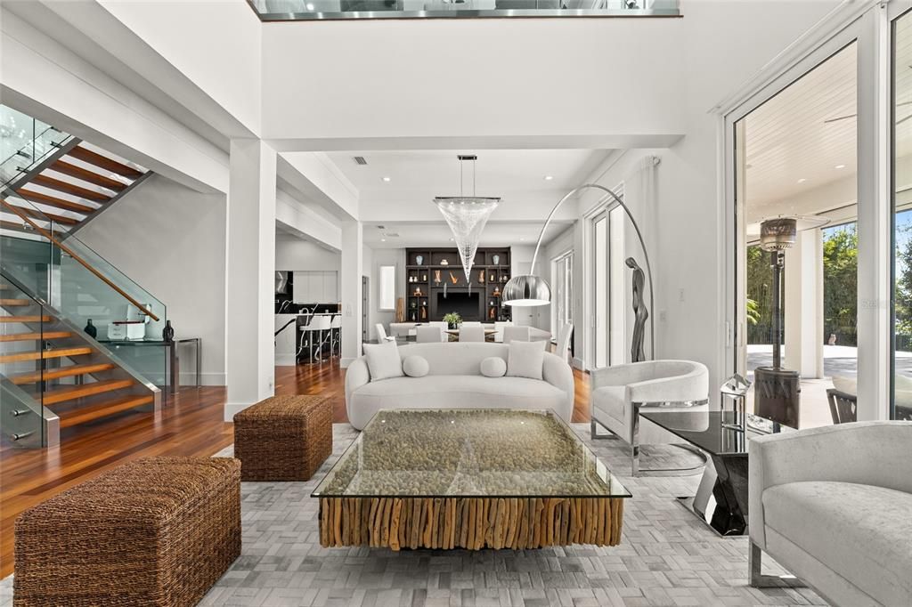 Chandelier, Dining room, Interior, Kitchen, Living room, Pendant Lights, Recessed Lighting, Wood Texture Flooring