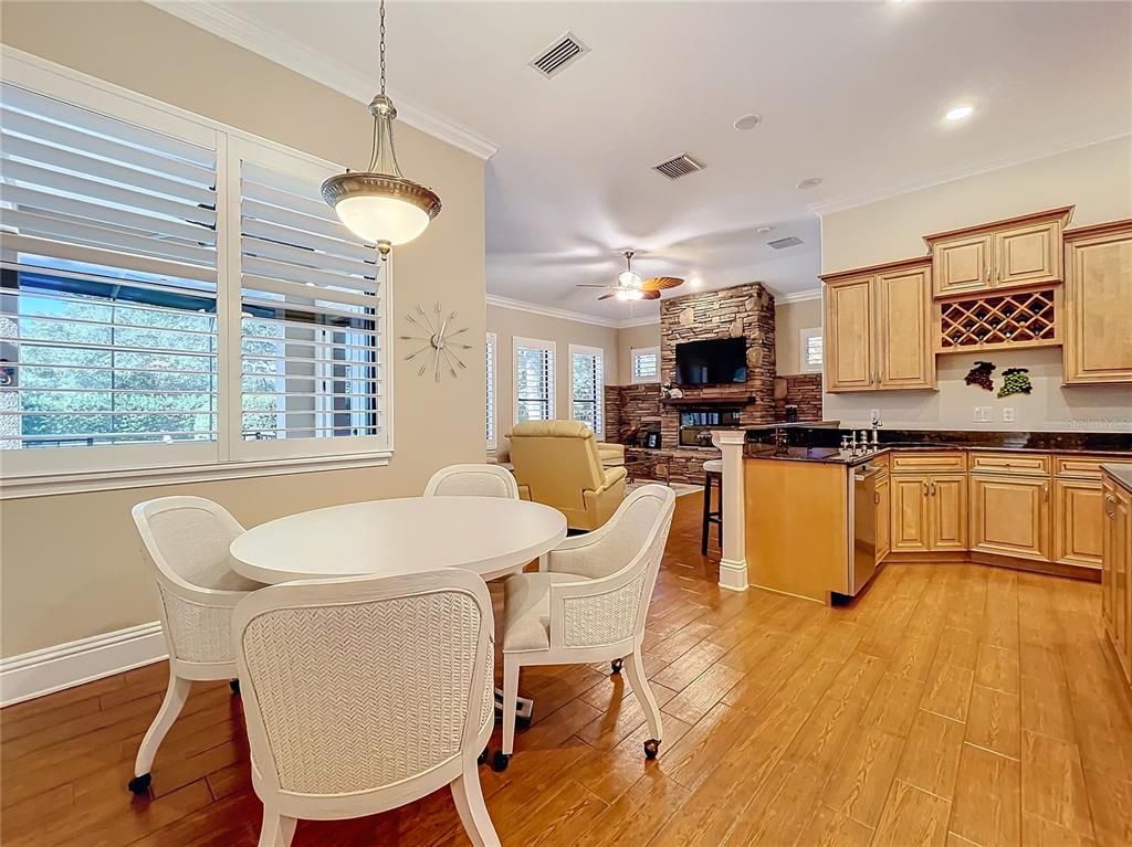 Dining room, Fireplace, Interior, Kitchen, Pendant Lights, Recessed Lighting, Stone Walls, Wood Texture Flooring