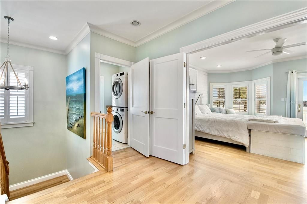 Bedroom, Interior, Recessed Lighting, Utility Closets, Washer, Wood Texture Flooring