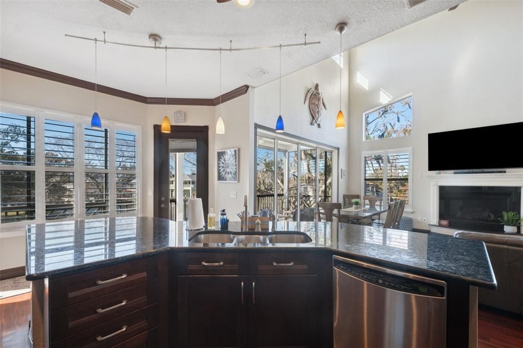 Dining room, Fireplace, Interior, Kitchen, Pendant Lights, Wood Texture Flooring