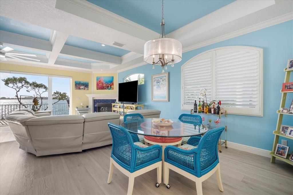 Chandelier, Dining room, Fireplace, Interior, Living room, Recessed Lighting, Wood Texture Flooring