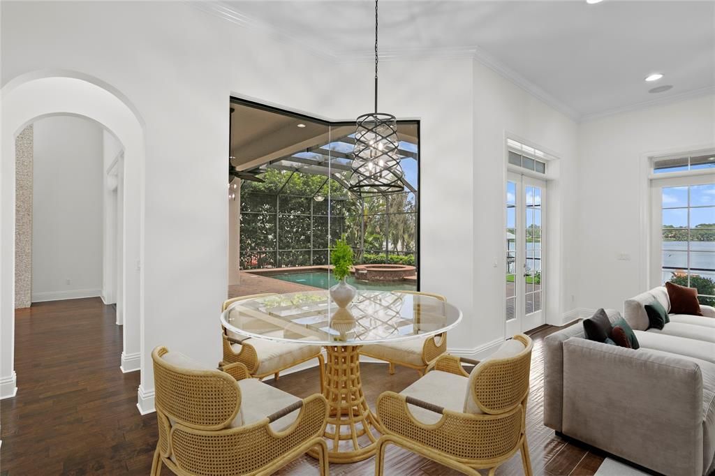 Dining room, Glass Ceilings, Interior, Living room, Pendant Lights, Pool, Recessed Lighting, Sun Room, Water, Wood Texture Flooring