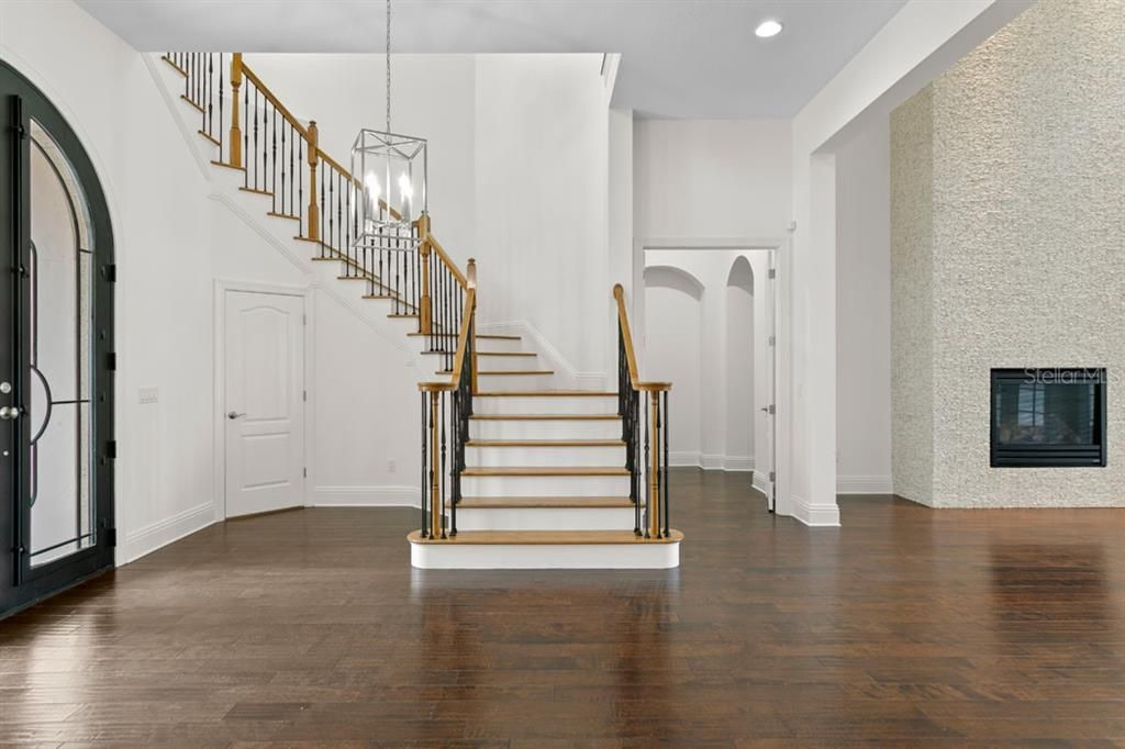 Fireplace, Interior, Pendant Lights, Recessed Lighting, Wood Texture Flooring