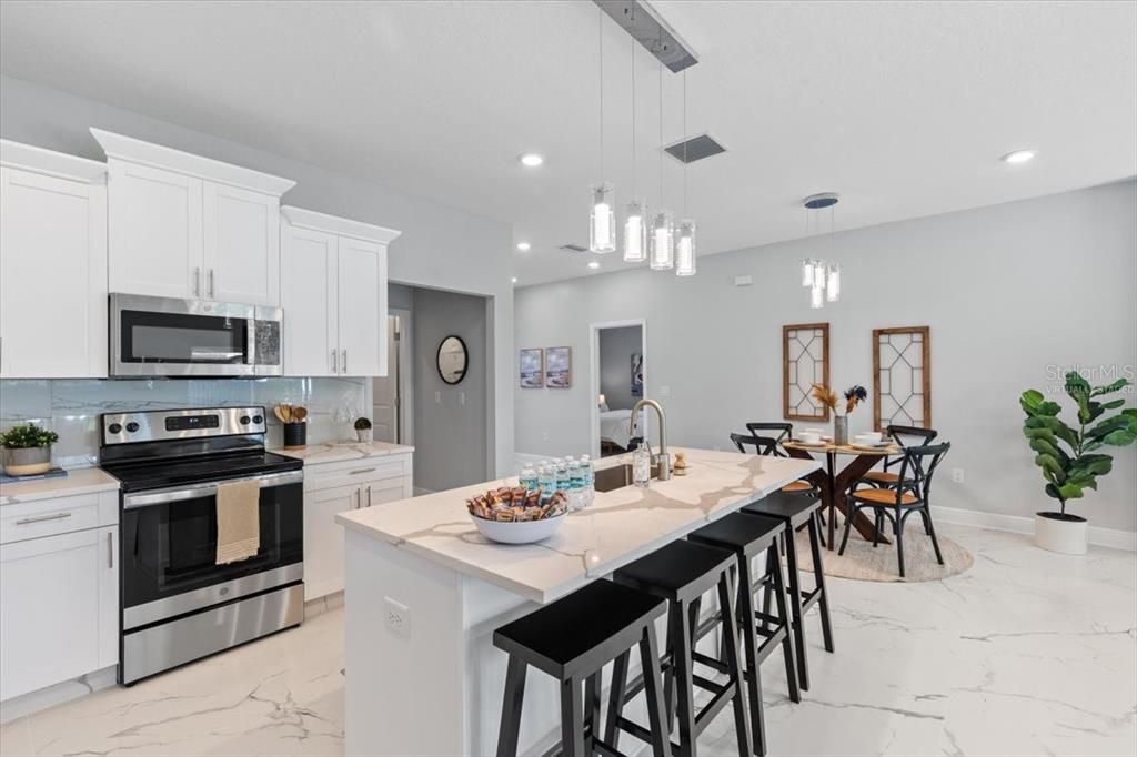 Dining room, Interior, Kitchen, Marble, Pendant Lights, Recessed Lighting, Stainless Steel Appliances