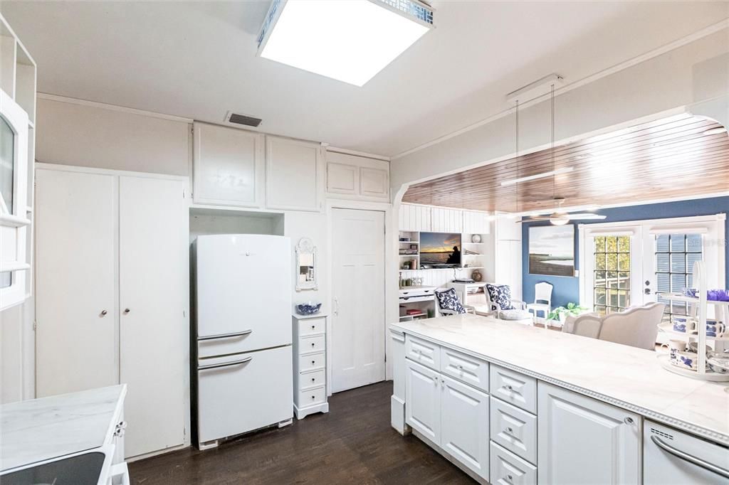 Interior, Kitchen, Pendant Lights, Tile Countertops, Wood Texture Flooring