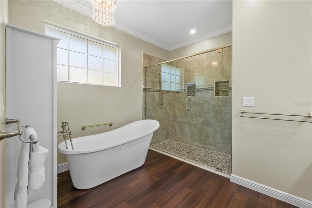 Bathroom, Free Standing Baths, Glass Shower, Interior, Recessed Lighting, Wood Texture Flooring
