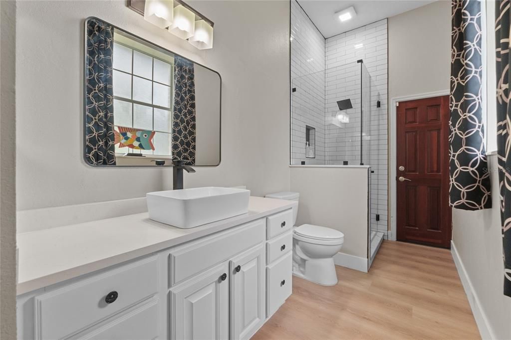 Bathroom, Glass Shower, Interior, Recessed Lighting, Wood Texture Flooring