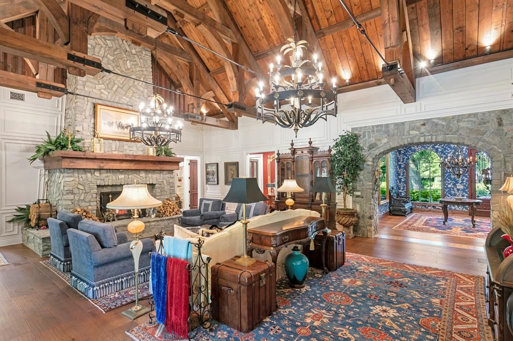 Chandelier, Fireplace, Interior, Living room, Stone Walls, Wooden Beams, Wooden Ceilings, Wood Texture Flooring