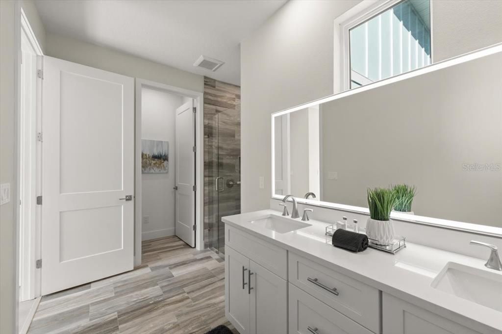 Bathroom, Dual Sink Vanities, Glass Shower, Interior, Wood Texture Flooring