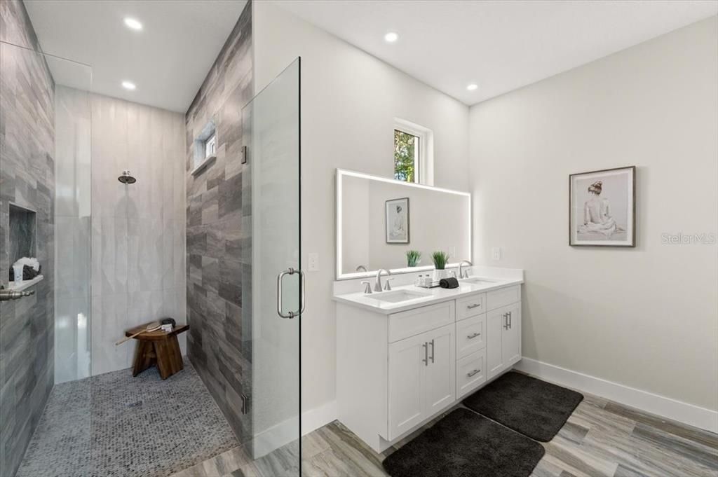 Bathroom, Dual Sink Vanities, Glass Shower, Interior, Recessed Lighting, Wood Texture Flooring