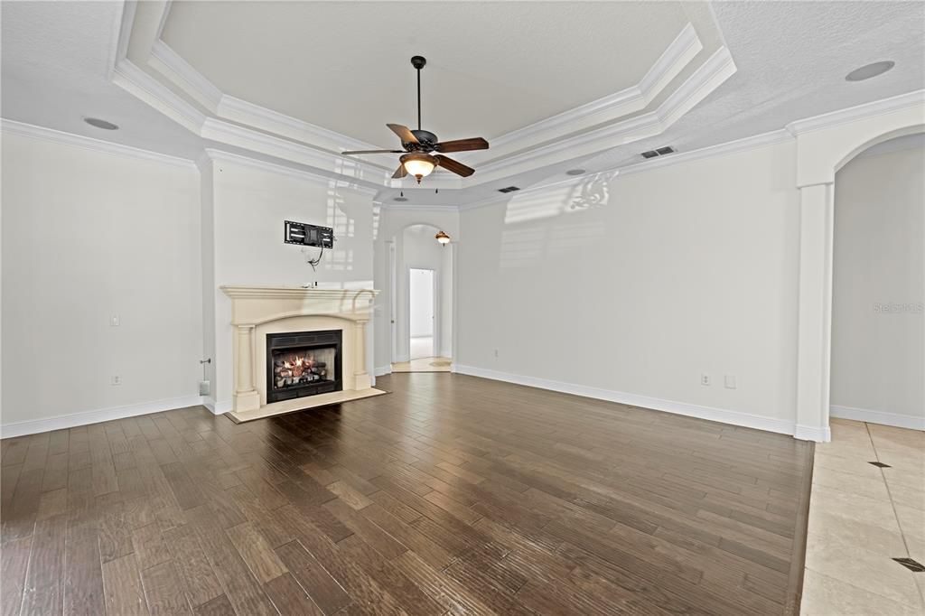 Empty room, Fireplace, Interior, Recessed Lighting, Wood Texture Flooring