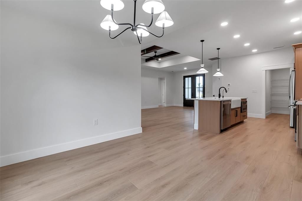 Empty room, Interior, Kitchen, Pendant Lights, Recessed Lighting, Wood Texture Flooring
