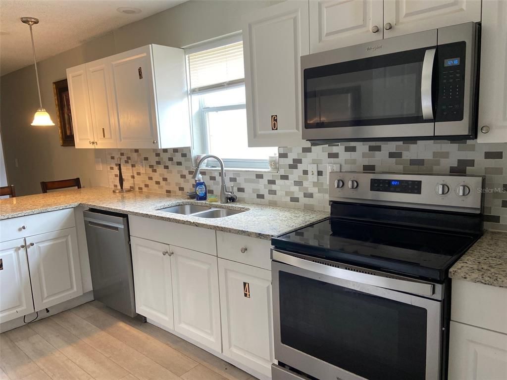 Interior, Kitchen, Pendant Lights, Stainless Steel Appliances, Wood Texture Flooring