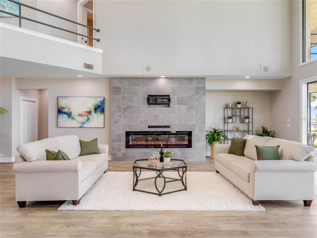 Fireplace, Interior, Living room, Recessed Lighting, Stone Walls, Wood Texture Flooring