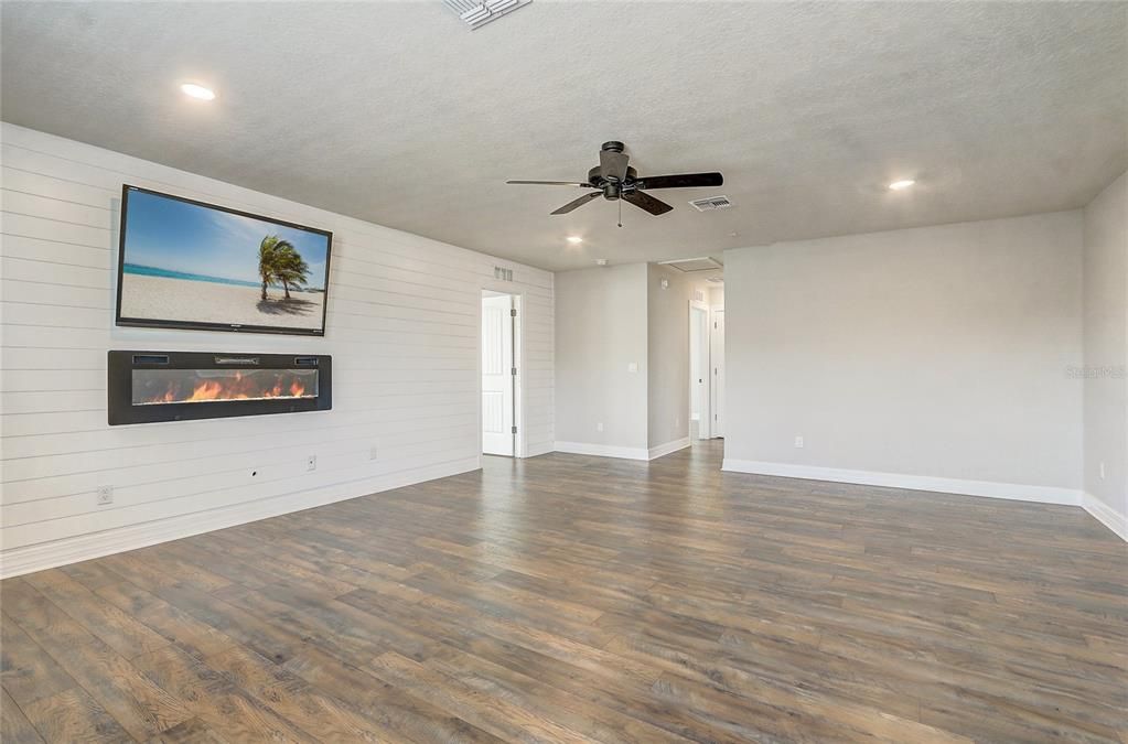 Empty room, Fireplace, Interior, Recessed Lighting, Wood Texture Flooring