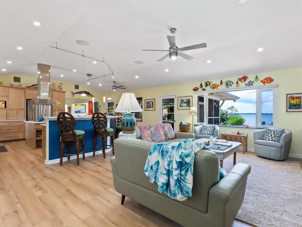 Interior, Kitchen, Living room, Pendant Lights, Recessed Lighting, Stainless Steel Appliances, Water, Wood Texture Flooring